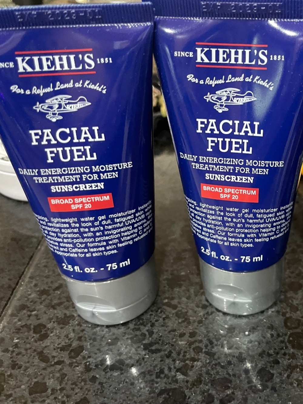 KIEHLS men’s daily energizing moisture treatment -approx $50 new per bottle